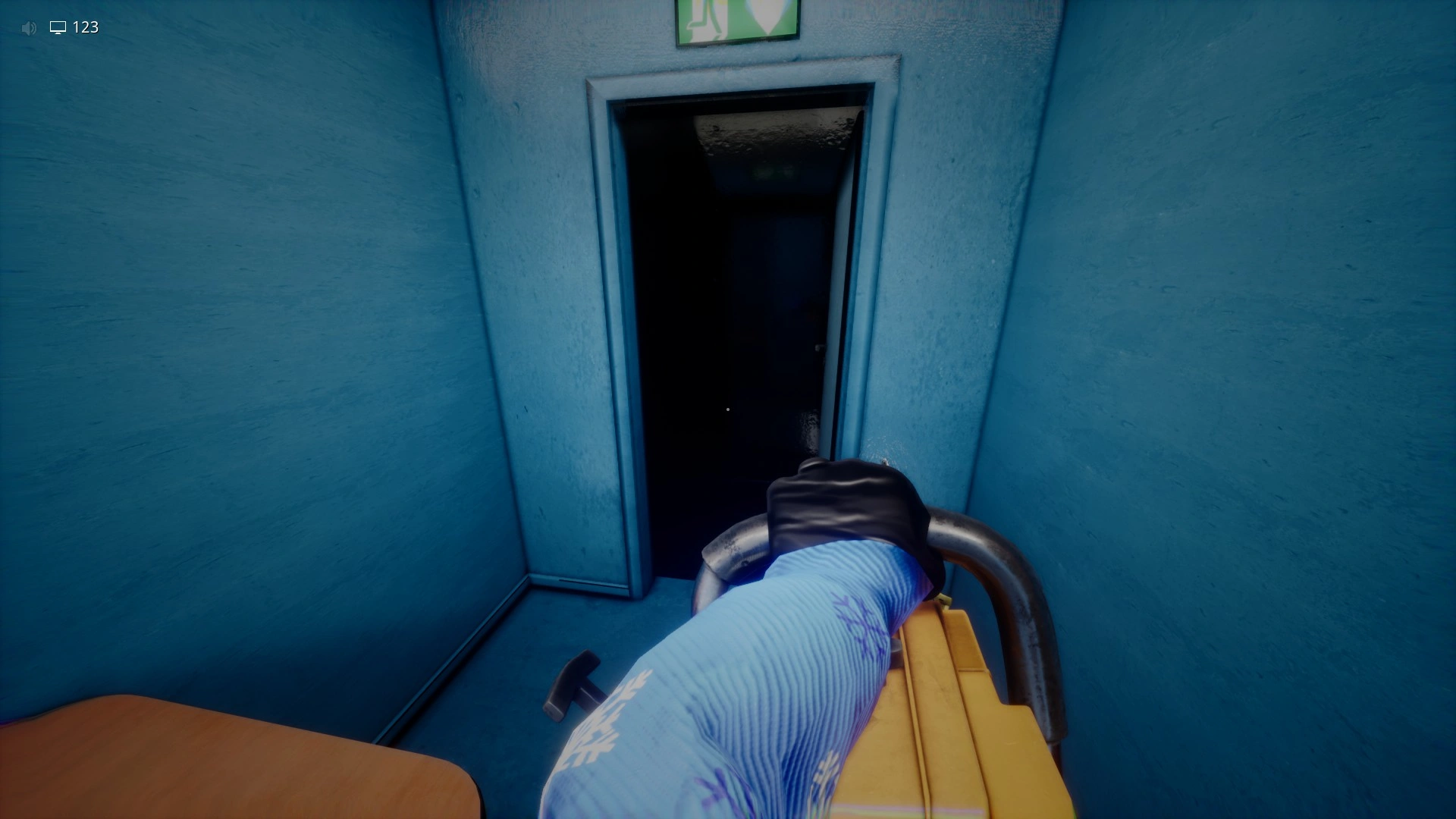 Picking up the chainsaw to cut open the locked door in Level !-! Hotel Chase, Escape The Backrooms